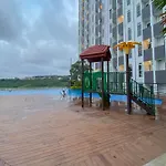 Comfortable 1Br Without Living Room At Amartha View Apartment By Travelio
