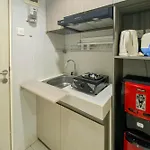 Comfortable 1Br Without Living Room At Amartha View Apartment By Travelio