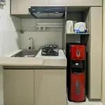 Comfortable 1Br Without Living Room At Amartha View Apartment By Travelio
